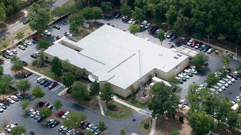 Aerial view of the Alachua County Communications and Emergency Center with a Siplast roofing solution.